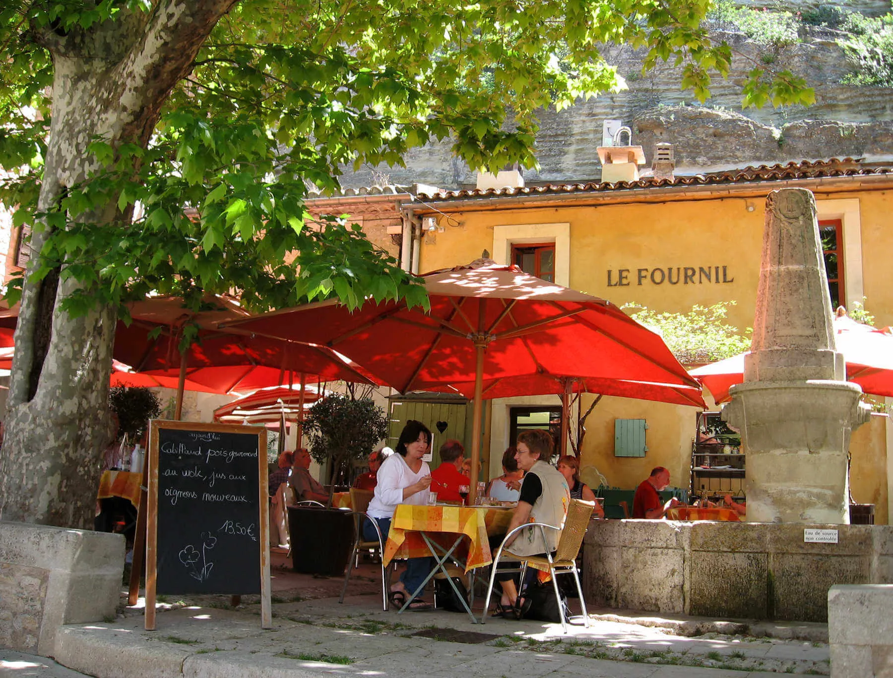 Splurging at a French restaurant often includes dining leisurely at an outdoor table