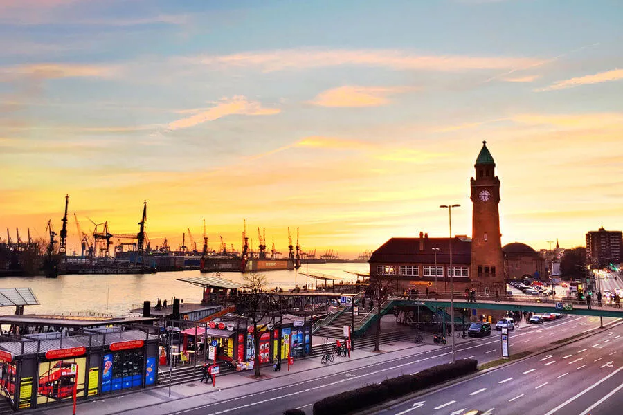 The sun sets over Hamburg's huge port, one of Europe's busiest, which accommodates about 9,000 vessels a year