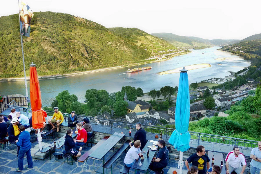 At Jugendherberge Stahleck, one of Europe's most scenic hostels, travelers sleep in a medieval German castle and enjoy a royal view of the Rhine River