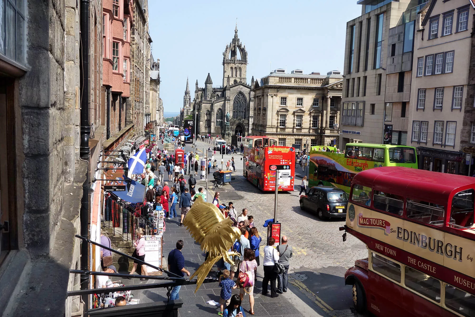 The Royal Mile offers a leisurely and fascination-filled stroll through history, souvenir shops, and tourists